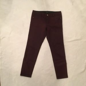 BURGUNDY COATED SKINNY JEANS